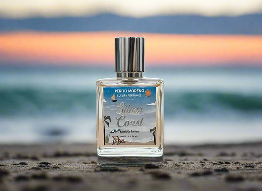 Perito Moreno Silver Coast perfume bottle on a wooden surface with a light gray background